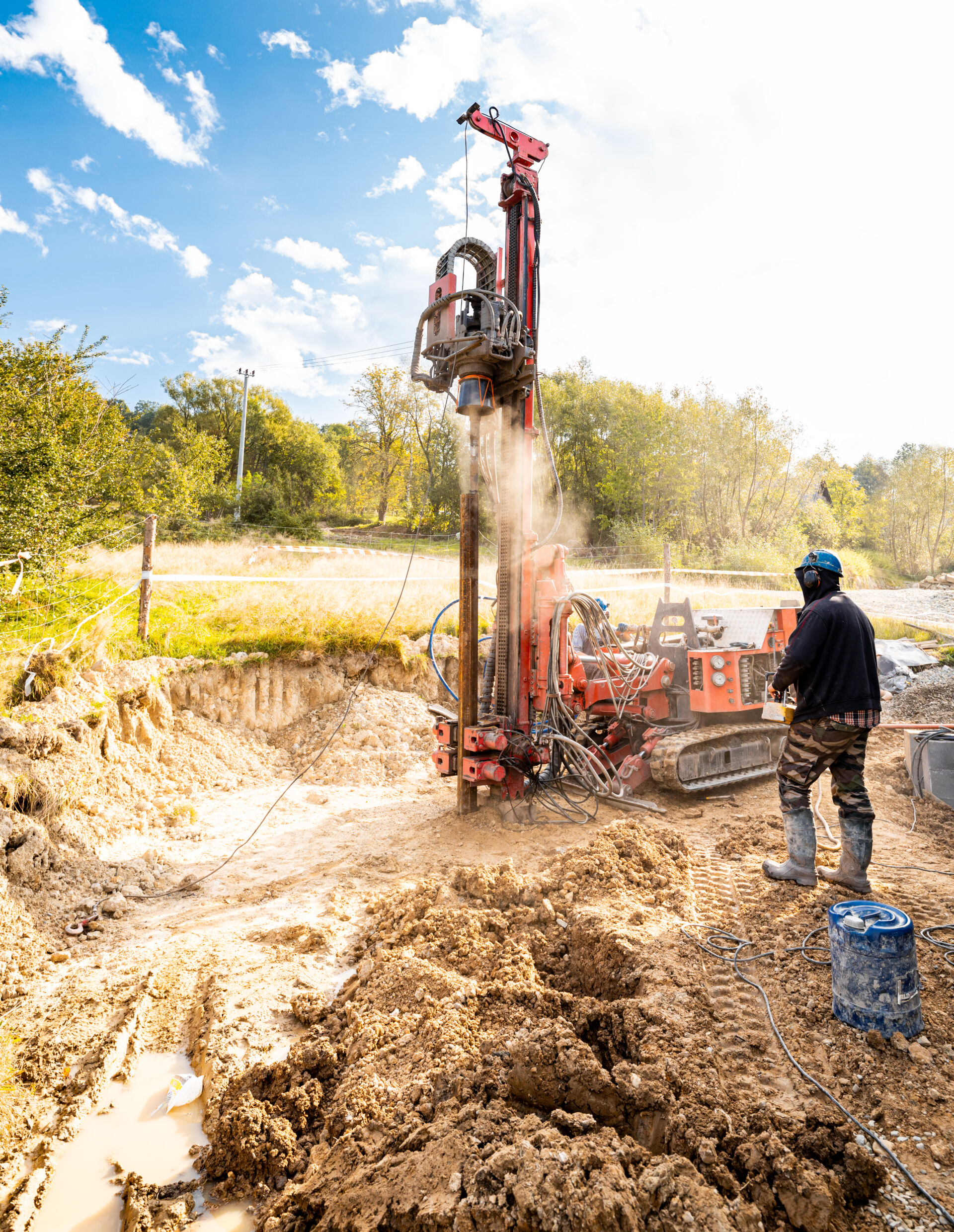 Drilling wells in the ground using a professional drill and machine